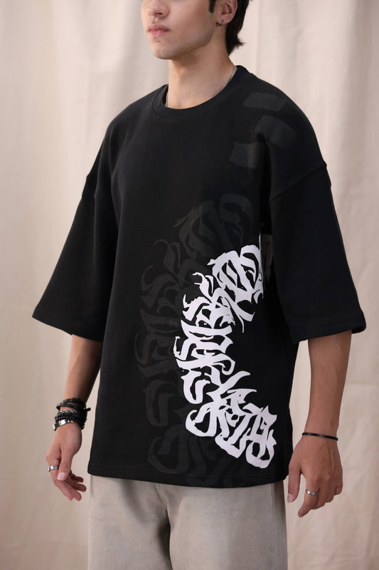 Arkaan black oversized drop shoulder unisex t-shirt by Shatrnj