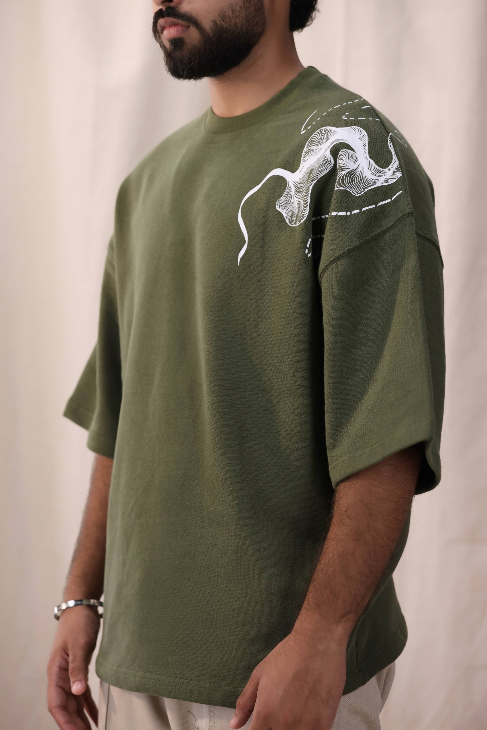 Cartela olive green oversized drop shoulder unisex t-shirt by Shatrnj